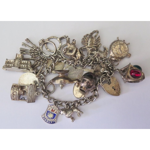 489a - A Silver Charm Bracelet, 62.6g