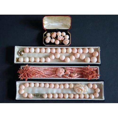 513 - Chinese Carved Coral Necklaces and earrings and coral bead necklace. (Phone Bid)