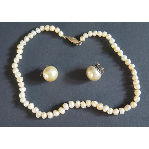 520 - A Pearl Necklace with 14K gold clasp and pair of clip earrings