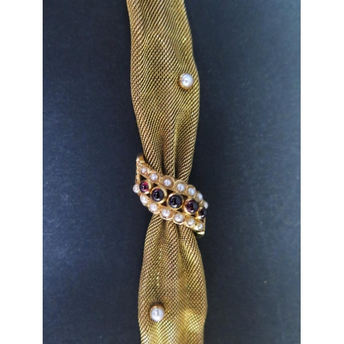 523a - An 18ct Gold Mesh, Cabochon Garnet and Pearl Bracelet, stamped 800 and with three clubs and G, 18cm,... 