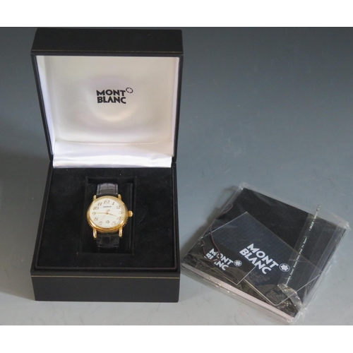 532 - An 18K Gold MONTBLANC Wristwatch, boxed and with service guide