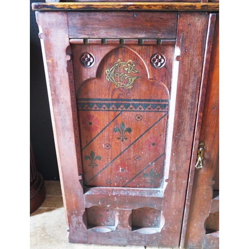 542 - An Early Arts & Crafts Cabinet in the Reformed Gothic Movement Style with roundels to the top painte... 