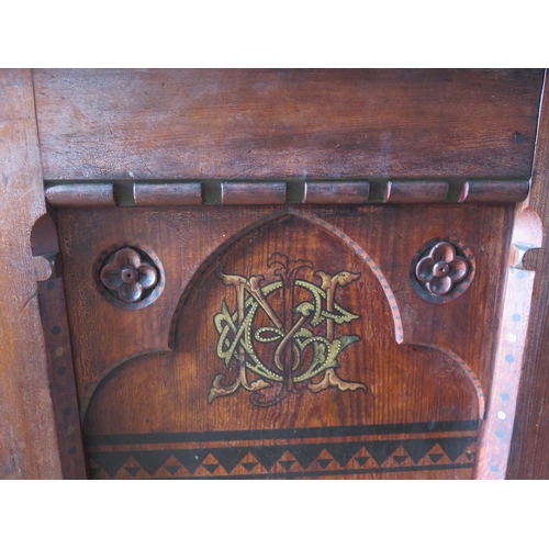 542 - An Early Arts & Crafts Cabinet in the Reformed Gothic Movement Style with roundels to the top painte... 