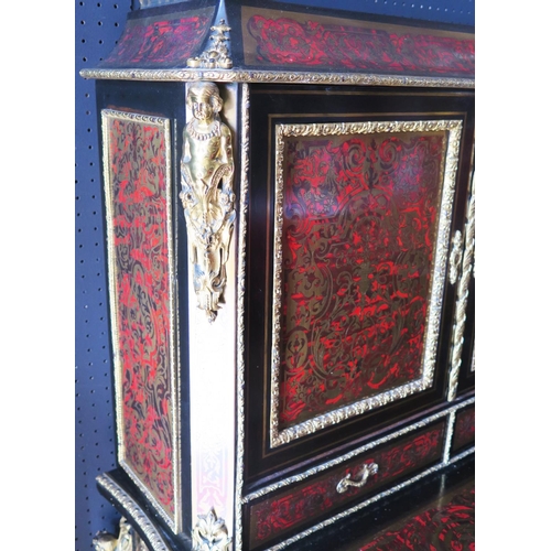 548 - A 19th Century French Boulle Bonheur du Jour with cabriole legs mounted with gilt angels to the shou... 