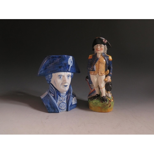 93 - A Late Staffordshire Nelson Jug, 27.5cm and Napoleon character jug 21cm