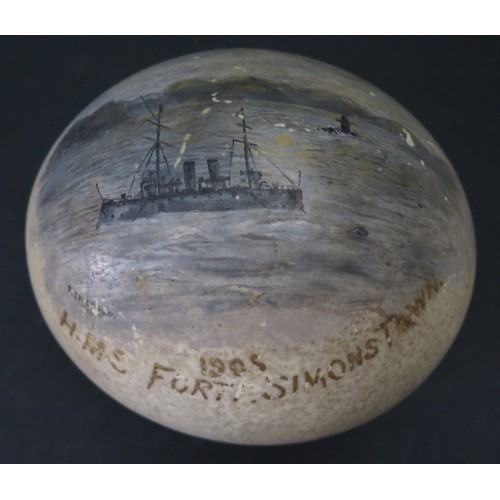 118 - An Ostrich Egg hand painted with a scene of H.M.S. FORTE, SIMONSTOWN 190?