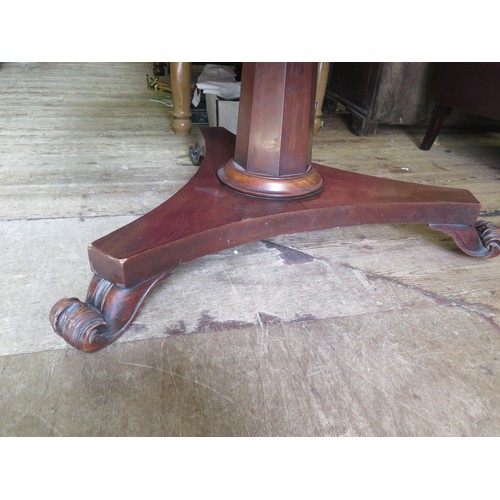 546A - A Victorian Mahogany Tilt Top Circular Dining Table with a tripod base and scroll/lion claw feet.
di... 