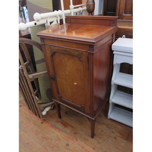 1057 - A Figured Walnut Cabinet