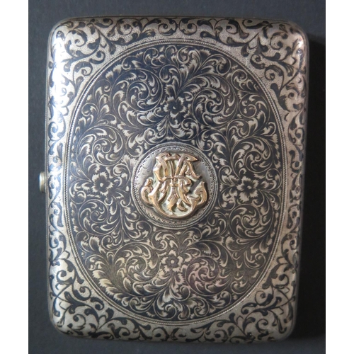 152 - A Russian Silver and Niello Engraved Cigarette Box decorated with a scene of family on a twin horse ... 