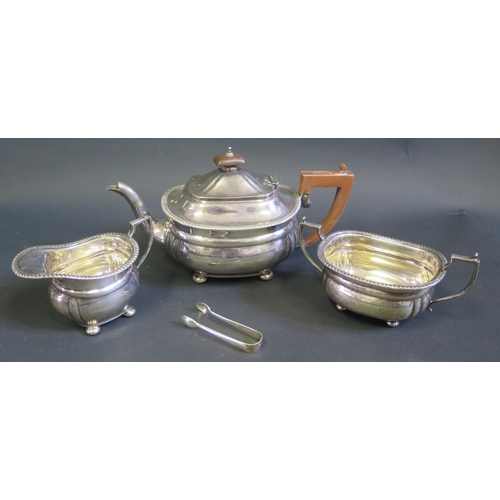 153 - A George V Silver Three Part Tea Set, Birmingham 1934, Robert Pringle & Sons and a pair of sugar ton... 