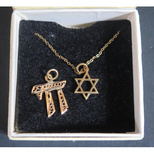 163 - A 9ct Gold Six Sided Star Pendant on chain (1.5g) and unmarked Chinese pendant (.7g)