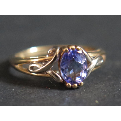 165 - A 9ct Gold and Tanzanite Ring, size L.5, 2.4g