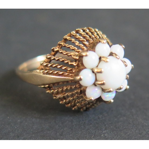 216 - A 9ct Gold and Opal Cluster Ring, size N.5, 4g