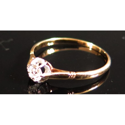 220D - An 18ct Gold Diamond Solitaire Ring, size M.5, 1.4g