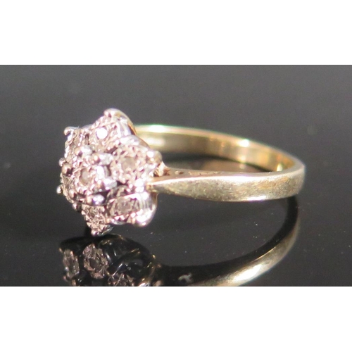 220E - A 9ct Gold and Diamond Cluster Ring, size Q.5, 4g