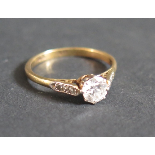 220F - A Diamond Solitaire Engagement Ring in an 18ct Yellow Gold and Platinum Setting, size M, 2.1g