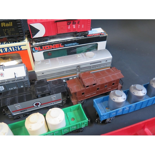 249 - A Collection of O Gauge Lionel Rolling Stock including 3 metal made and two boxed plus one K-Line. M... 