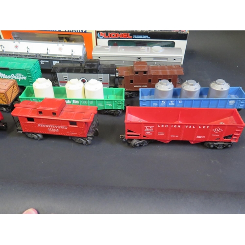 249 - A Collection of O Gauge Lionel Rolling Stock including 3 metal made and two boxed plus one K-Line. M... 