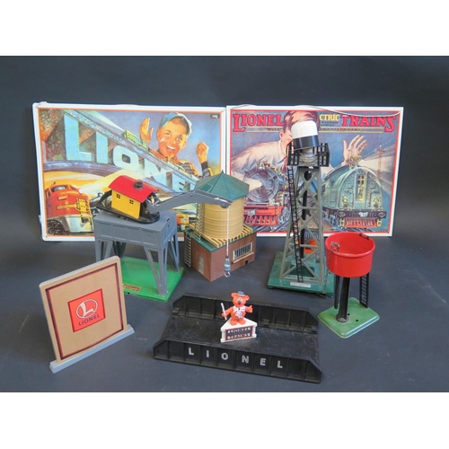 251 - A Selection of O Gauge Buildings/Accessories and two reproduction Lionel Advertising Signs.