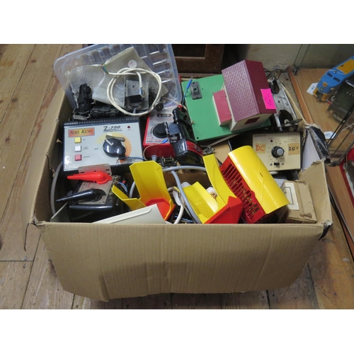 252 - A Box of Model Railway Transformers, OO gauge track and other oddments including MTH Railking and Le... 