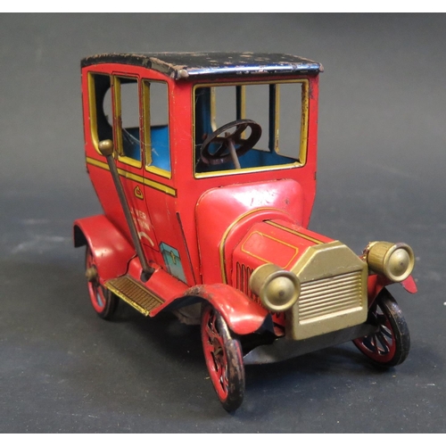 279 - A Japanese Modern Toys Tinplate Clockwork Veteran Car (untested).