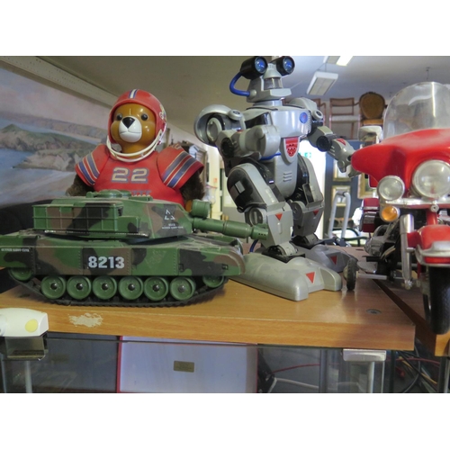 288 - Seven Battery Operated Toy Tanks, Airplane, Bike etc.