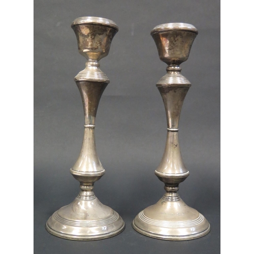 72 - A Pair of Modern Loaded Silver Candlesticks, Birmingham 1976, B&Co., 20.5cm high