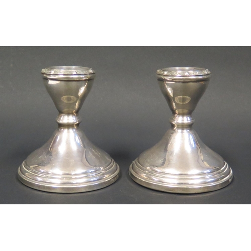 73 - A Pair of Modern Loaded Silver Candlesticks with Celtic style decoration, Birmingham 1962, Adie Bros... 