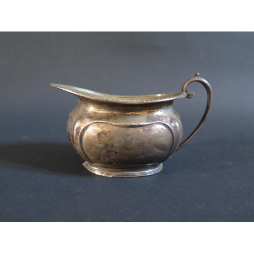 83 - A George V Silver cream jug, Sheffield 1910, George Edward & Sons (David & George Edward), 132g