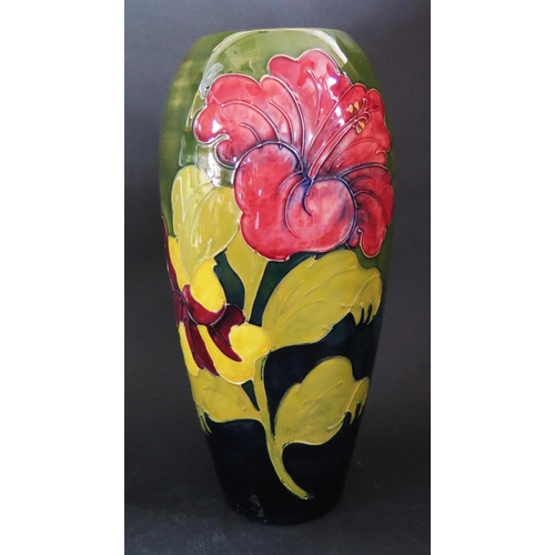 144 - A W. Moorcroft Hibiscus Decorated Green Ground Vase, 31cm
