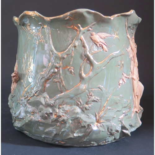 152 - A Marbled Green Ceramic Jardinière decorated with a high relief scene of Artemis with a variety of a... 