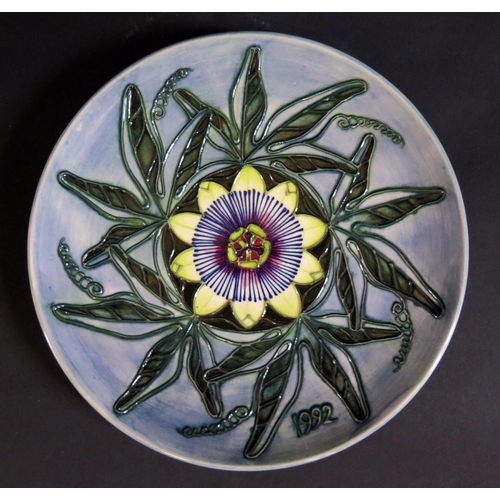 33 - A Modern Moorcroft Limited Edition 1992 Year Plate decorated with passion flower, 174/500, 22cm