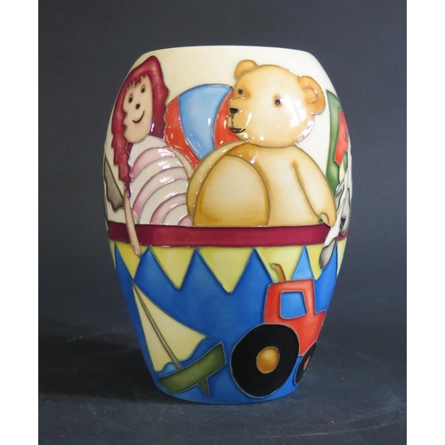 38 - A Modern Moorcroft Limited Edition Vase decorated with children's toys by Sian Leeper 2003, 303/350,... 