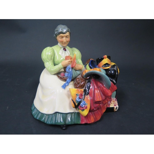 727 - A Royal Doulton Figurine The Wardrobe Mistress HN2145