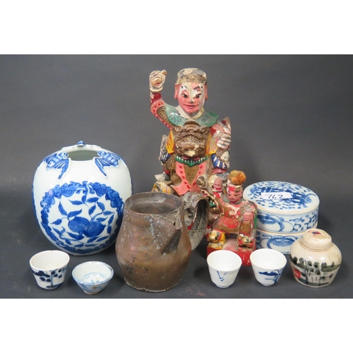 762 - A collection of Chinese Oddments including painted wooden figures, receipt indicating Tibetan copper... 