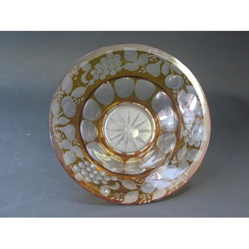 171 - A Nineteenth Century Amber Overlay Cut Glass Bowl with slice cut and fruiting foliate decoration, 16... 
