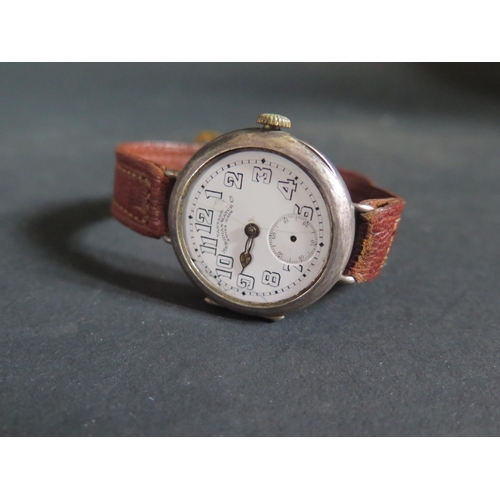 556 - A Vantage Meridian Watch Co. Silver Cased Tank Watch, running with faults