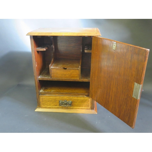 751A - A Edwardian Inlaid Smoker's Cabinet