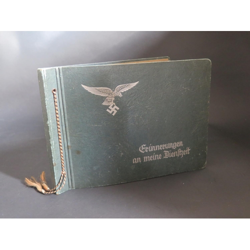 789B - A WWII German Erinnerungen an meine Dienstzeit Photograph Album, having belonged to a Luftwaffe offi... 