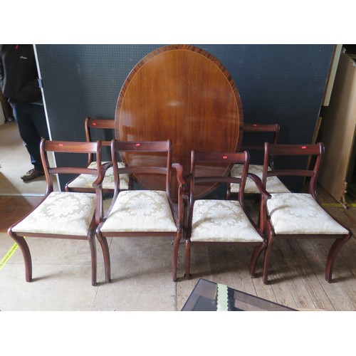 1081a - A Oval Inlaid Tilt Top Table On Claw Feet & Six Inlaid Chairs