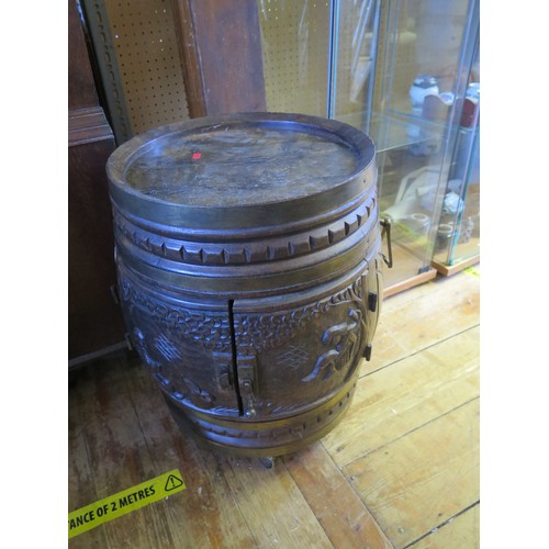 1095 - A French Carved Oak Bar Barrel trolley with twin hinged doors opening to compartment for bottles, c.... 