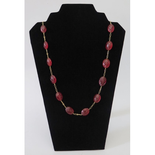 896 - A Carved Carnelian Necklace