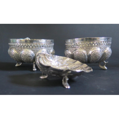 1028 - A Pair of Asian White Metal Footed Bowls (8.5cm diam.) and scallop shaped dish, 196g