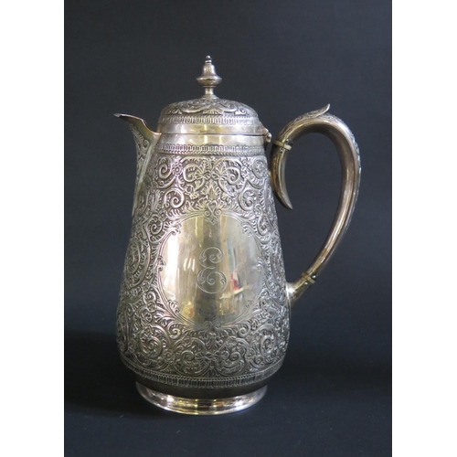 1030 - A Victorian Silver Coffee Pot in the Indian Style with heavily decorated acanthus leaf decoration, S... 