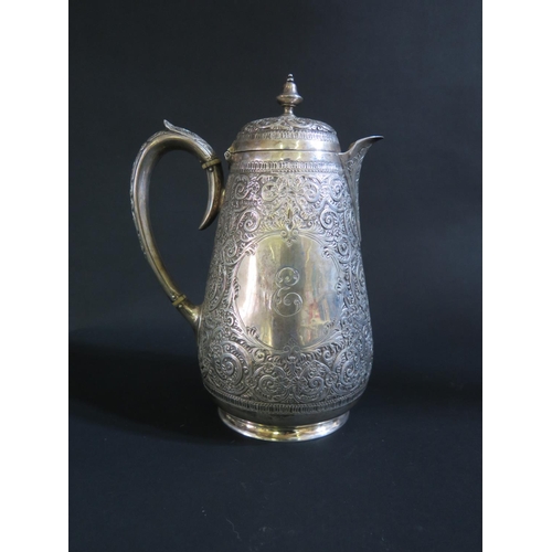 1030 - A Victorian Silver Coffee Pot in the Indian Style with heavily decorated acanthus leaf decoration, S... 