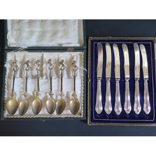 1031 - An Cased Set Six Continental Gilt Teaspoons stamped 000 and six cased sterling silver handled tea kn... 