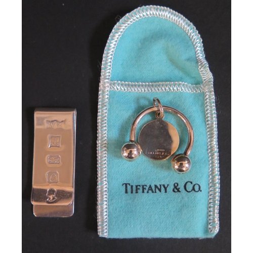 1055 - A Tiffany & Co. Silver Barbell engraved SILVER ARROW and a silver bookmark (Birmingham 1977, WM), 26... 