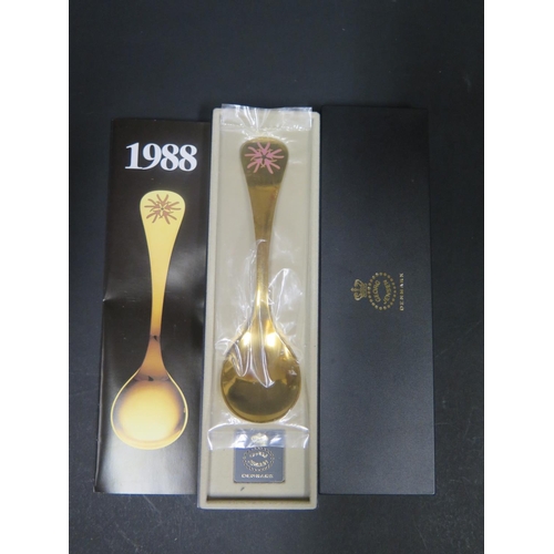 1100 - A Cased Georg Jensen 1988 Silver Gilt and Enamel Year Spoon, 15cm, sealed in bag, 43.8g