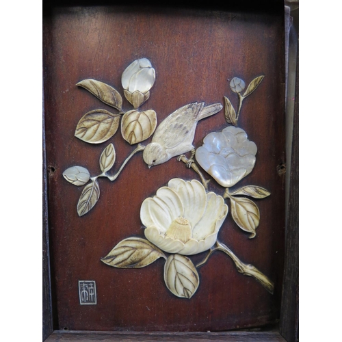 1145 - A Japanese Meiji Period Ivory and Mother of Pearl Plaque decorated with a blossoming branch and bird... 