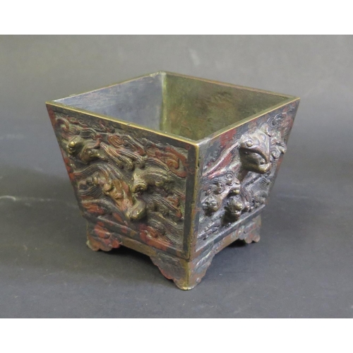 1157 - A Small Oriental Bronze Jardinière decorated with mythical beasts and with red patina, cast mark to ... 